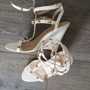 White Heels,Open concept with straps across the toes and ankles